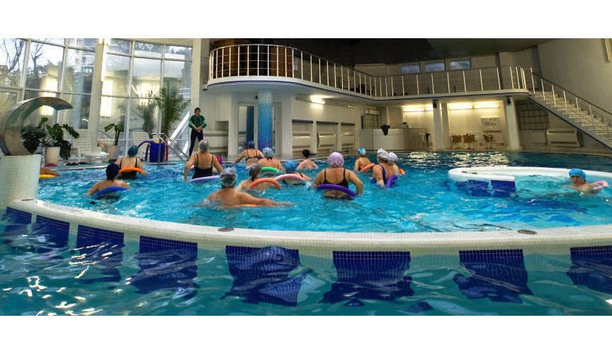 Vacationers at water aerobics classes in the pool of the sanatorium "Ai-Petri"